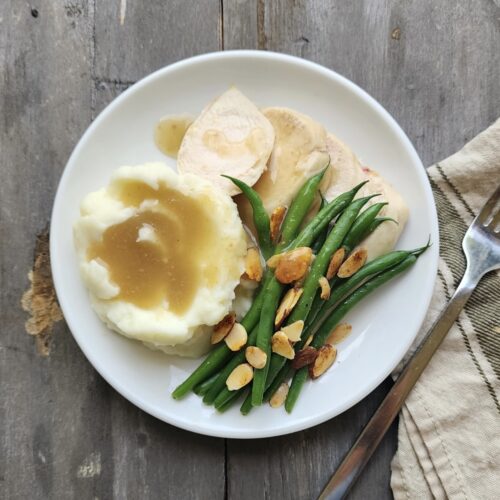 Roasted turkey breast with green bean almondine