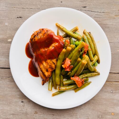 Smoked BBQ chicken breast with braised green bean