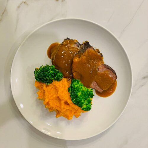 Braised beef short ribs with mashed sweet potato