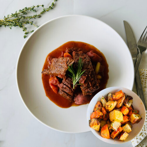 Braised beef short ribs with roasted root vegetables