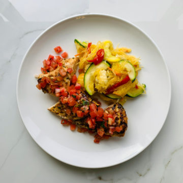 Chicken Bruschetta and spaghetti squash primavera