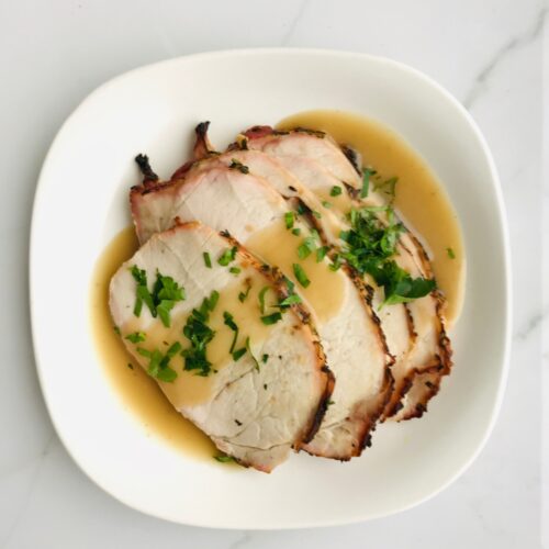 Herb roasted pork Loin with sauteed kale