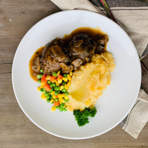 Salisbury steak with carrot, corn and peas