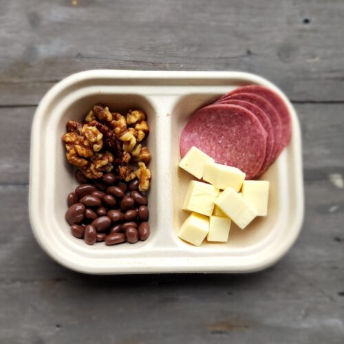 Snack Pack: Salami, Provolone Cheese, Walnuts, & Chocolate Covered Raisin.