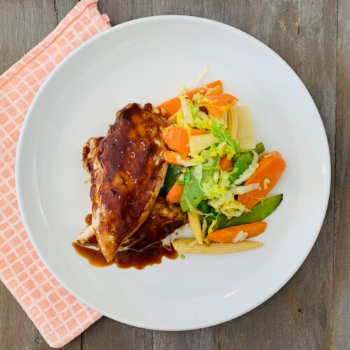 Teriyaki chicken served with asian vegetable