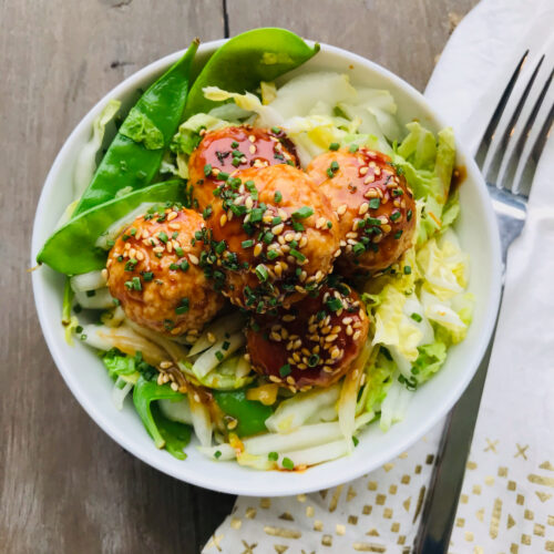 Sesame soy glazed chicken meatballs with Asian vegetable